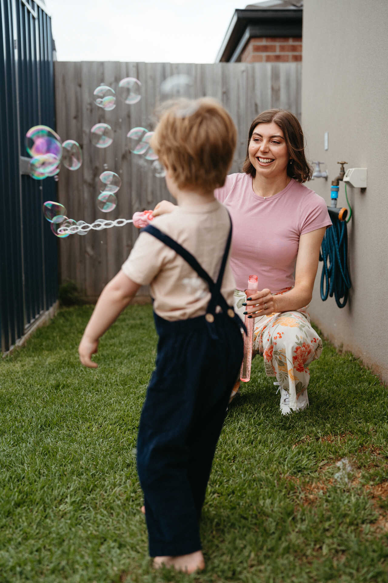 Cheeky Raspberries therapist plays bubbles with a learner